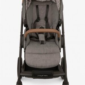 Nuna Pipa Gray and Tan Stroller leather handles